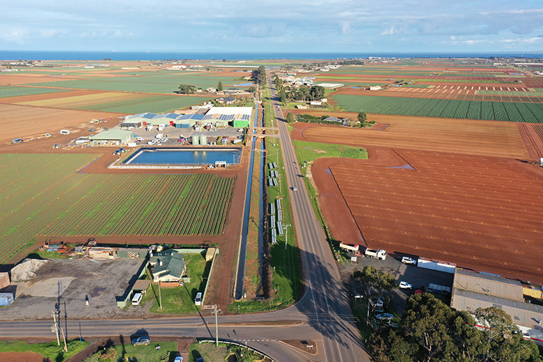 Birds-eye view of the project during construction, with the pipe ready to be installed. 