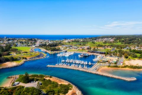 Looking across Bermagui Harbour in the foreground to Bermagui golf course and town centre in the background, located on the south coast of NSW.