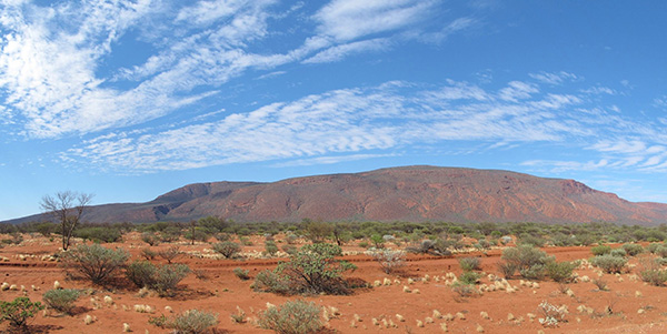 An image of Mount Augustus in Western Australia desert.