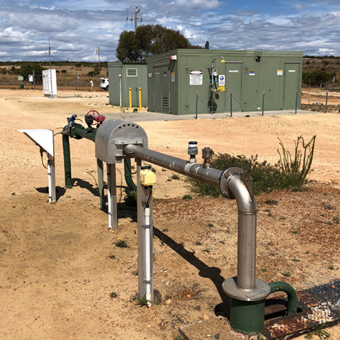 A bore in the foreground, which forms part of the Guilderton scheme in Western Australia, chlorine dosing building in background