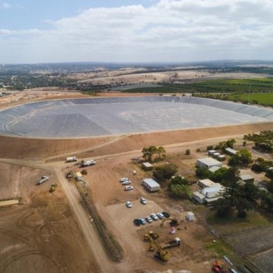 Aerial image showing construction of the new Mclaren Vale waste water facility to support the region’s grape industry. Cars and buildings can be seen in the foreground.