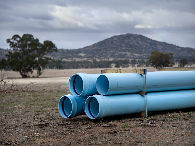 Blue pipes ready for laying at South West Loddon Rural Water Supply Project in Victoria