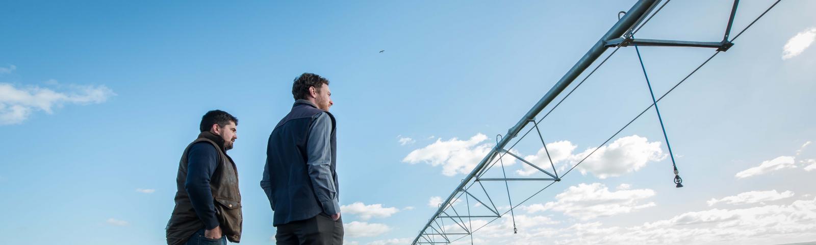 Western Water staff and farmer with pivot irrigator in the Parwan area of the Western Irrigation Network in Victoria